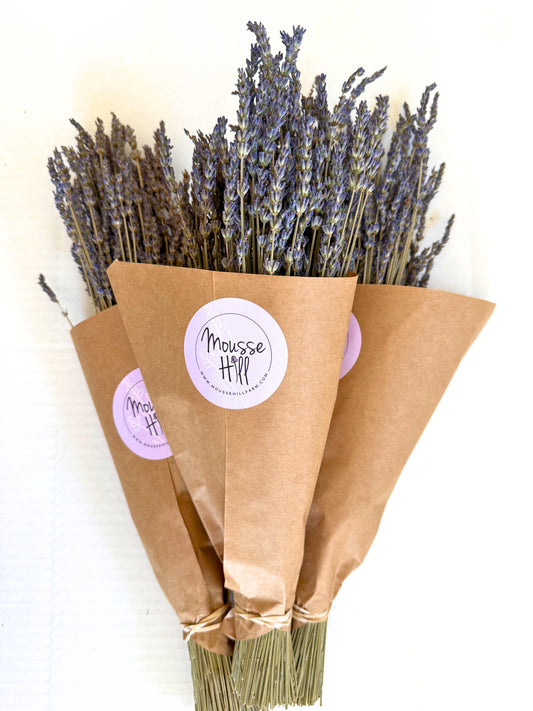Bouquet of lavender wrapped in brown paper with 'Mousse Hill' label